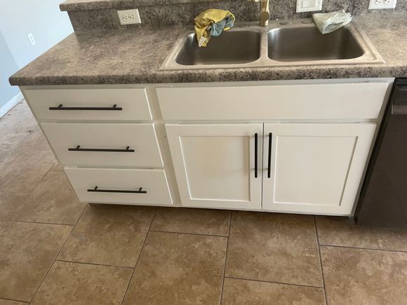 Same kitchen island with refinished white cabinets