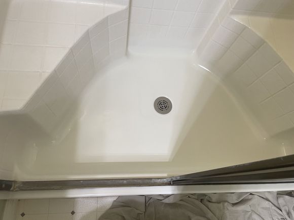 Same shower pan repaired and refinished smooth white