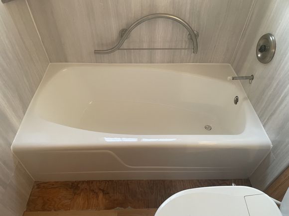 Same bathtub restored to a glossy white finish