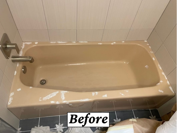 Yellowed and stained bathtub before refinishing